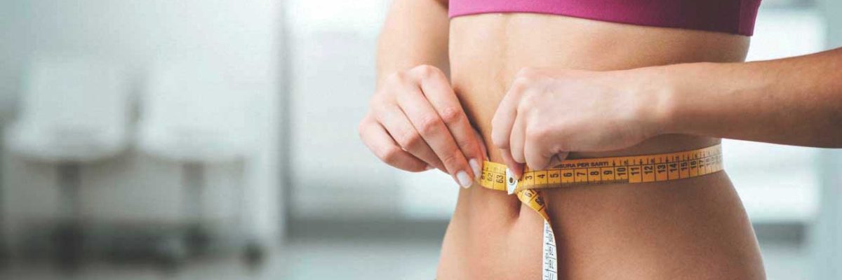 woman-measuring-stomach-1296x728